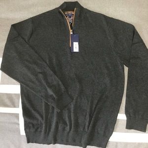 Zip front pull over sweater